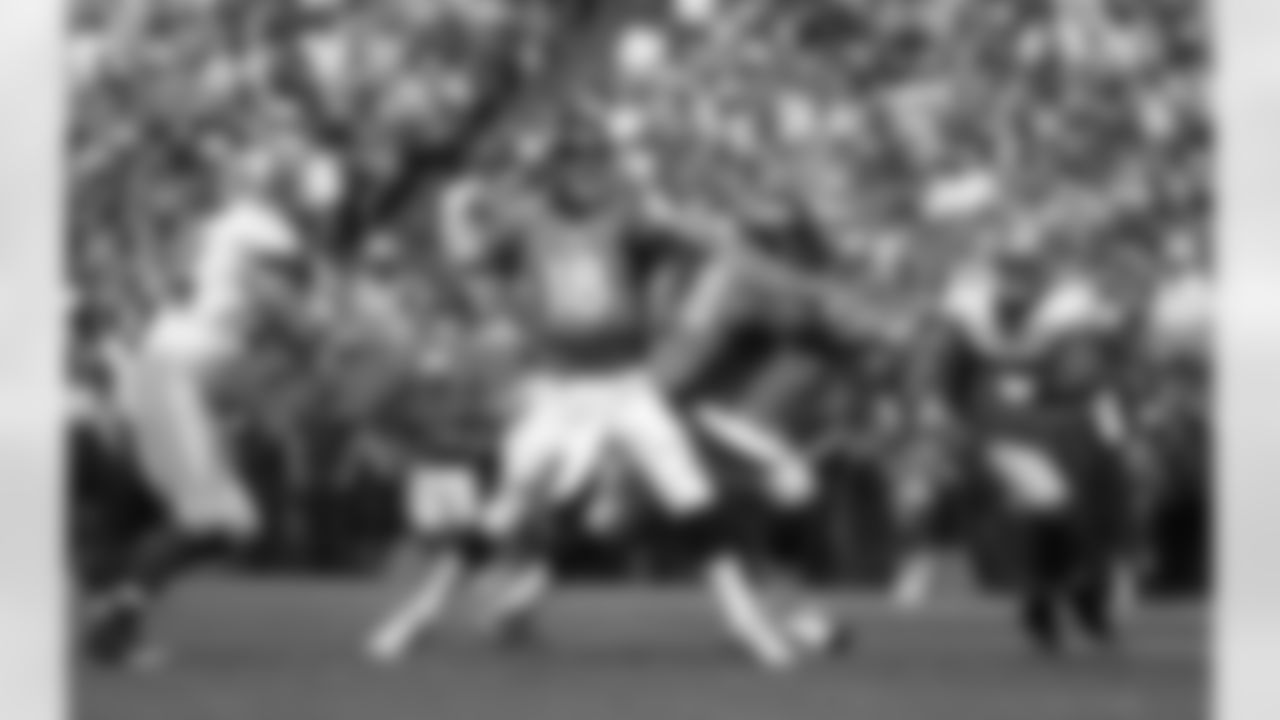 Quarterback Peyton Manning drops back to throw.
