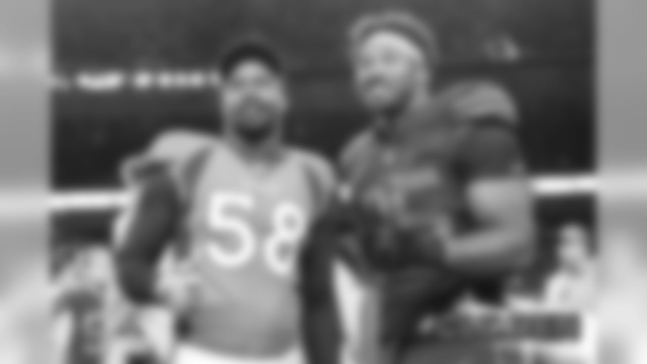 Von Miller and fellow Texas A&M alumnus Myles Garrett pose for a photo together after the Broncos' game against the Cleveland Browns at Empower Field at Mile High on November 3, 2019. (Photo by Ben Swanson)