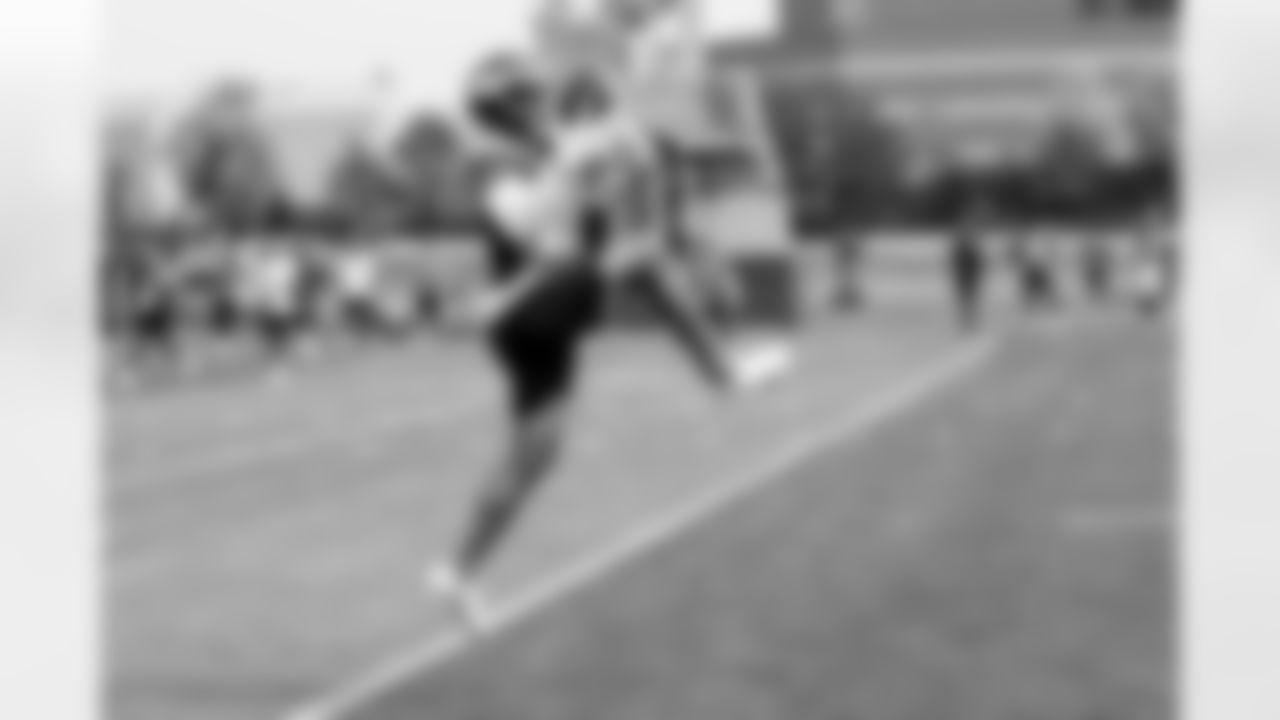 Bryce Callahan makes an interception during practice on Day 9 of training camp at UCHealth Training Center on August 7, 2021. (Photo by Ben Swanson)