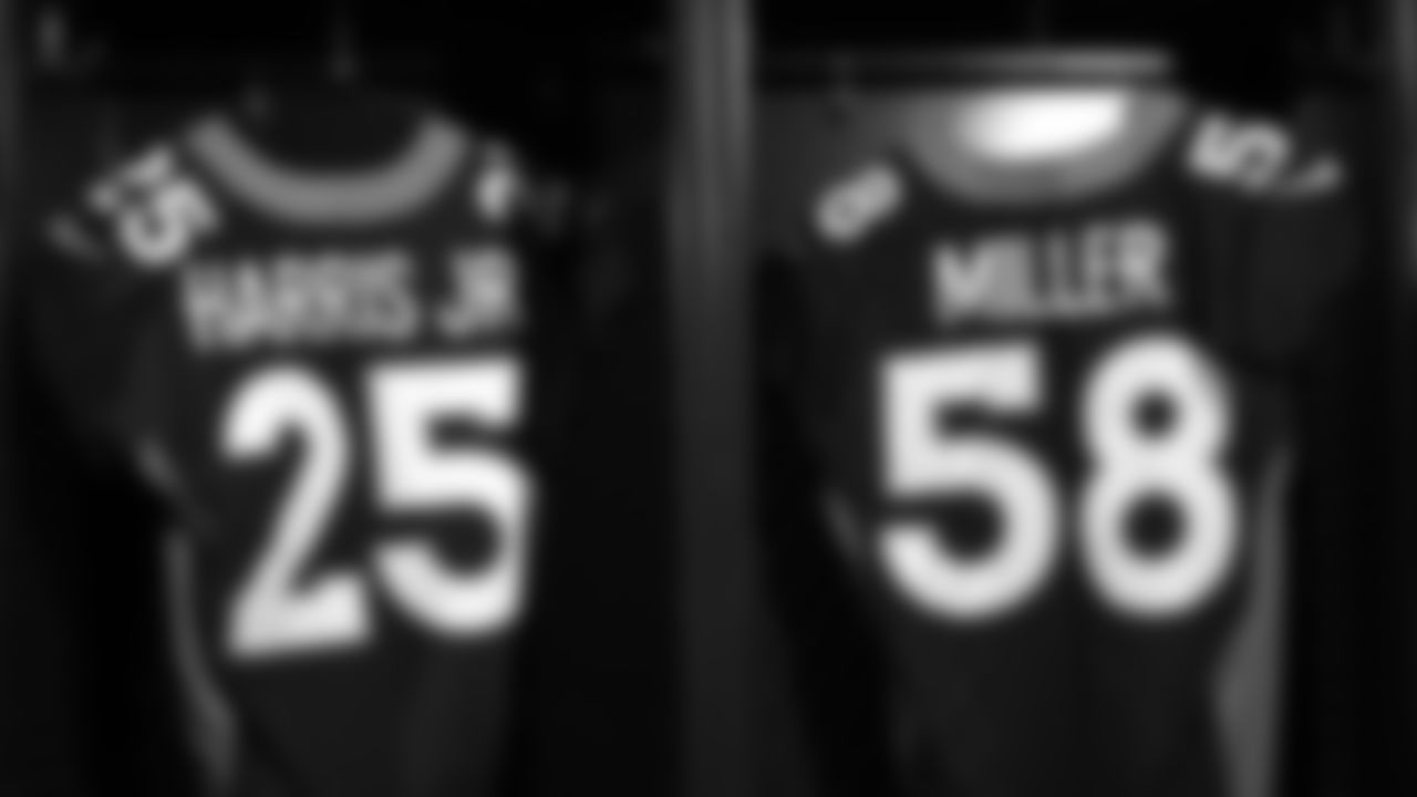 Chris Harris Jr.'s and Von Miller's jerseys during a photoshoot of the Broncos' alternate blue jerseys on October 10, 2019. (Photo by Ben Swanson)