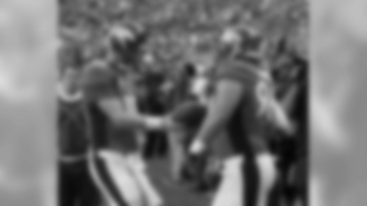 Manning and Unrein celebrate their touchdown connection.