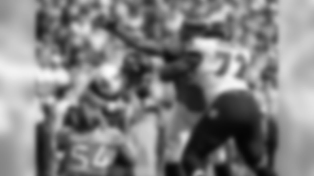 ILB Brandon Marshall (54) sacks QB Joe Flacco (5) as DE Antonio Smith (90) reaches for him.