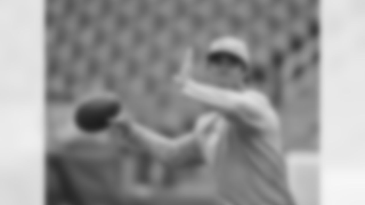 QB Brock Osweiler gets his warmed up before the Broncos' Week 5 battle with the New England Patriots.