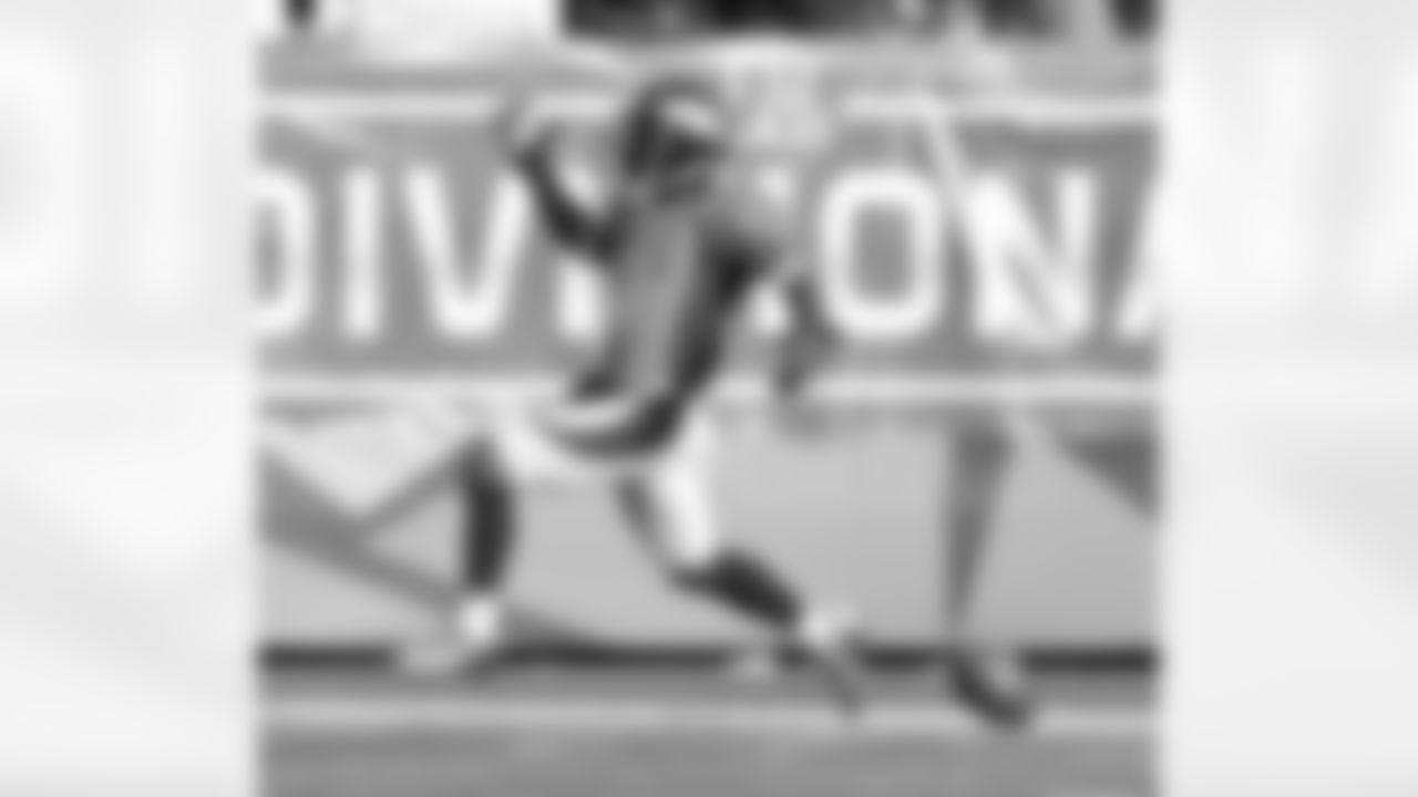 Holliday runs through the end zone for the touchdown.