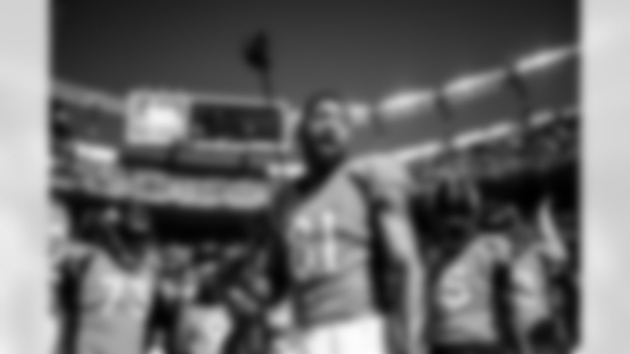 Tim Patrick gives a pregame speech in the team huddle during pregame warmups before the game against the Baltimore Ravens on October 3, 2021 at Empower Field at Mile High in Denver, Colorado. (Photo by Ben Swanson)