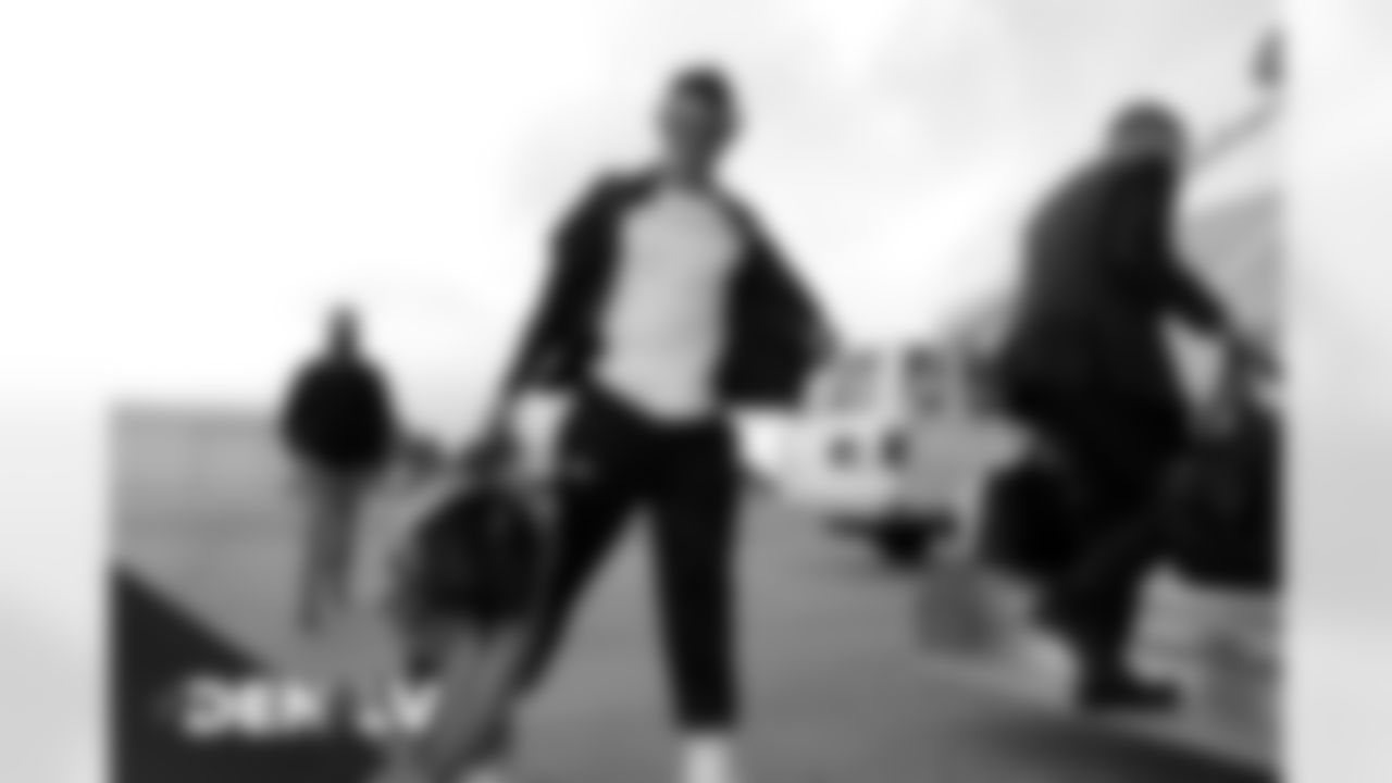 Drew Lock on the tarmac at Denver International Airport on November 14, 2020 during the team's travel to Las Vegas for a Week 10 game against the Raiders. (Photo by Joe Abdellah)