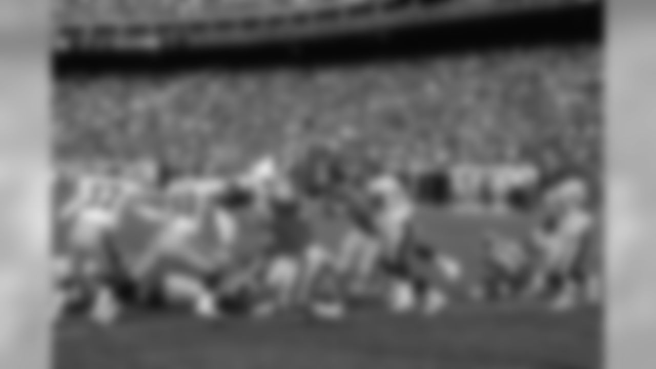 Running back Robert Delpino dives into the end zone during a November 21, 1993 win (37-13) against the Steelers.