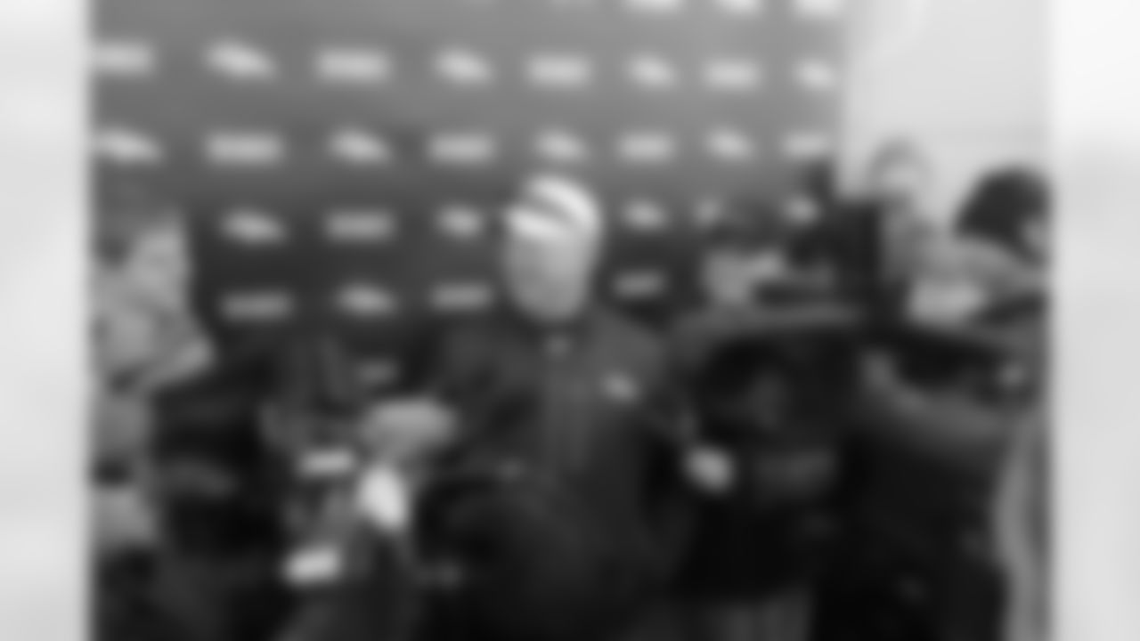 Fox talks to the press after practice.