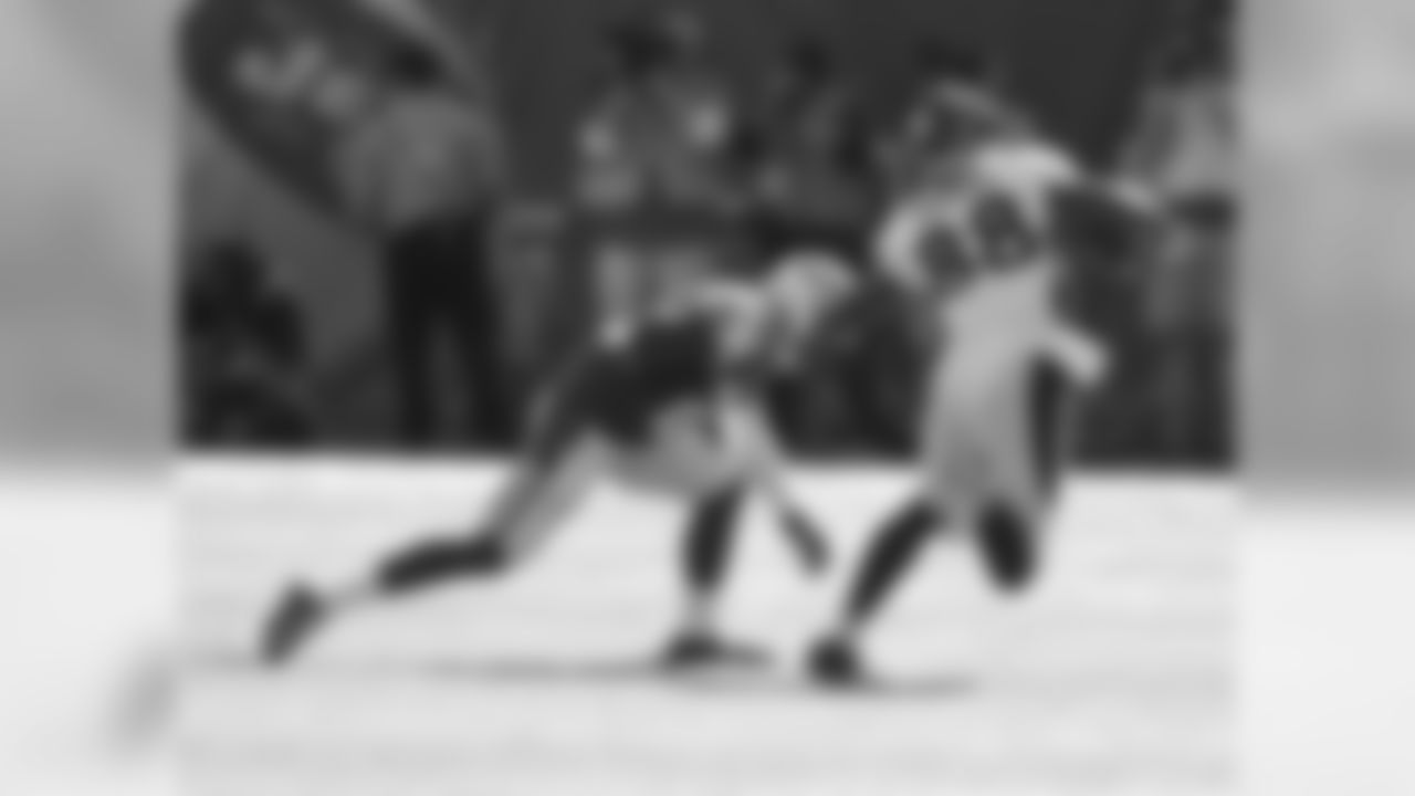 Phillip Adams and Demaryius Thomas