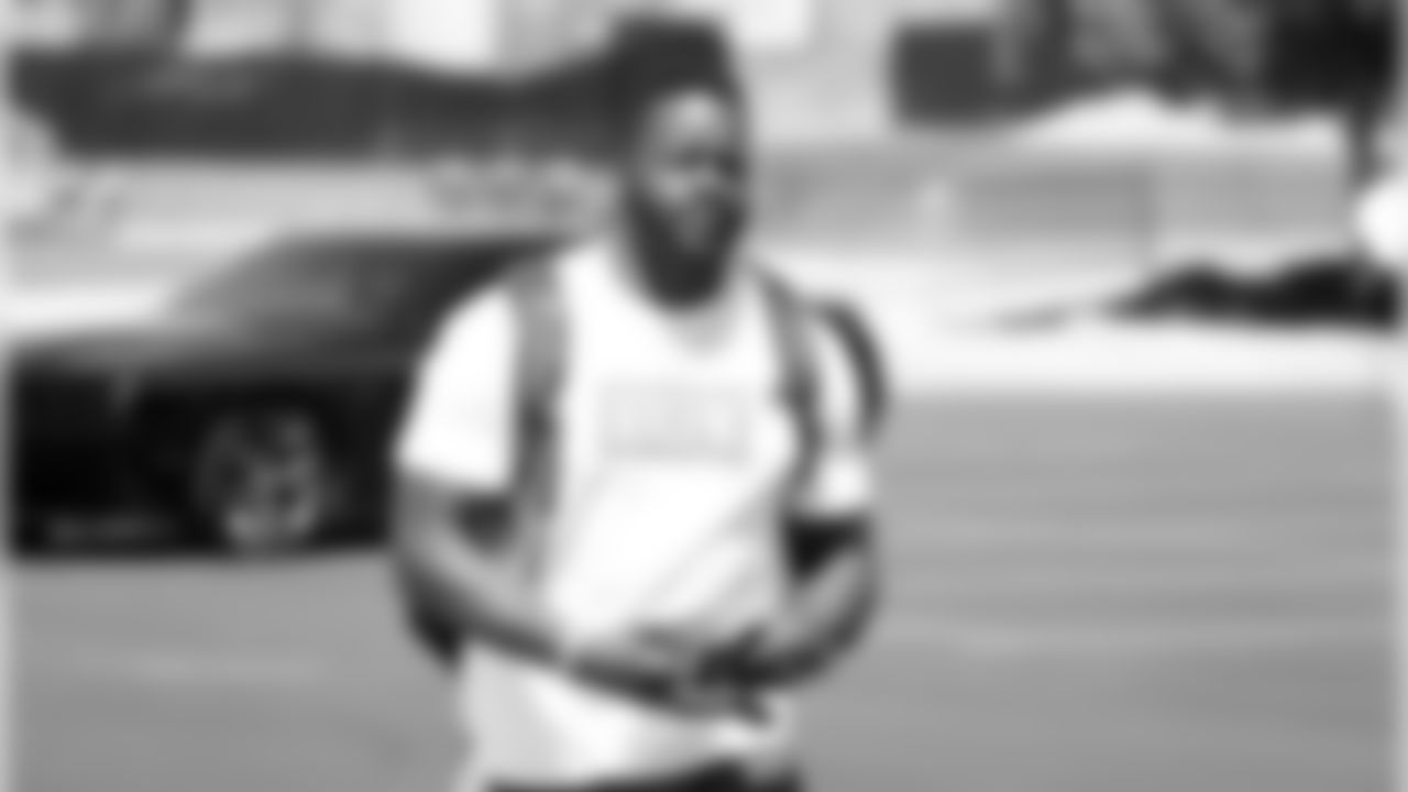 Kenny Anunike reports for training camp.