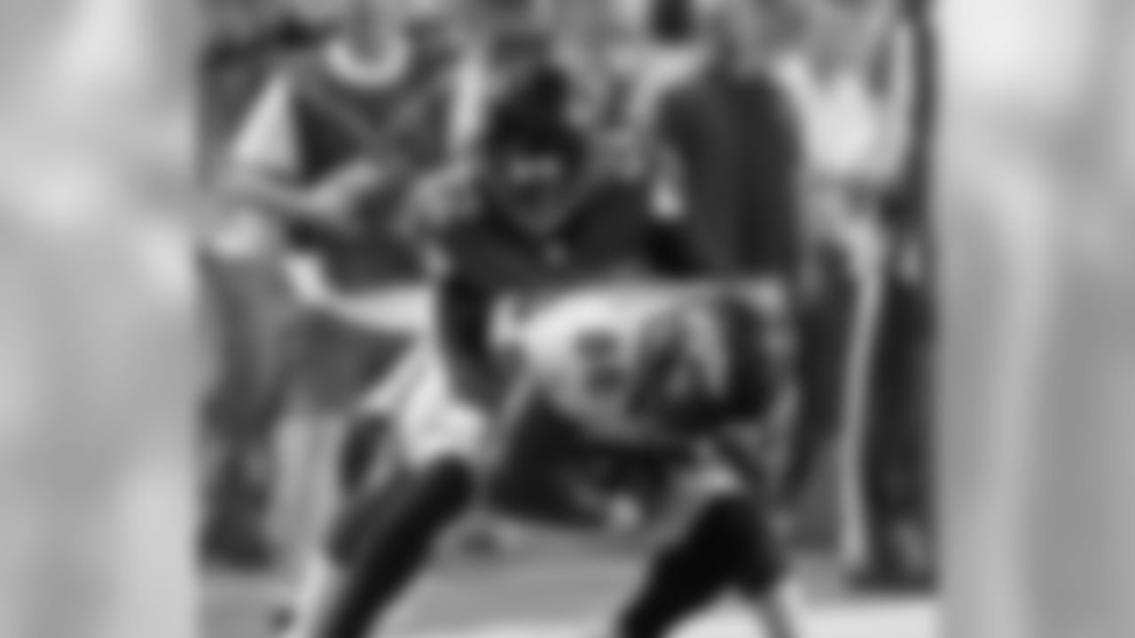 WR Demaryius Thomas fights for yards against the Atlanta Falcons.