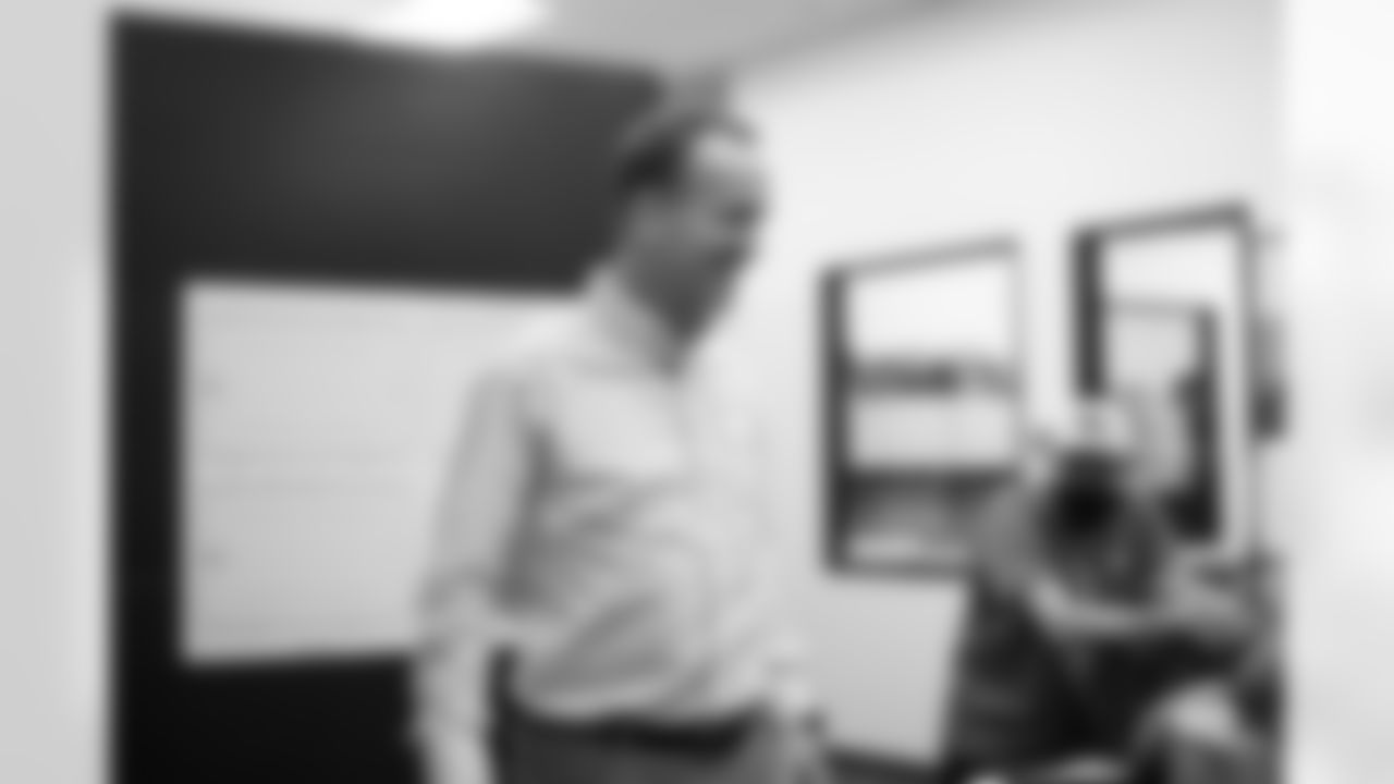 During filming for the Broncos' 2021 schedule release video, former quarterback and current "intern" Peyton Manning talks with Equipment Manager Chris "Flip" Valenti at UCHealth Training Center on May 10, 2021. (Photo by Ben Swanson)