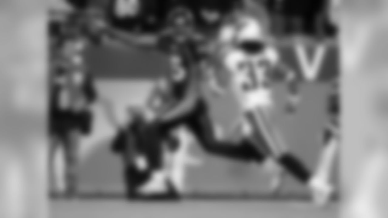 The Broncos easily won their first home game against the Titans after the team moved from Houston to Tennessee, in part because of this 41-yard touchdown reception by Brandon Marshall. (AP Photo/Jack Dempsey)