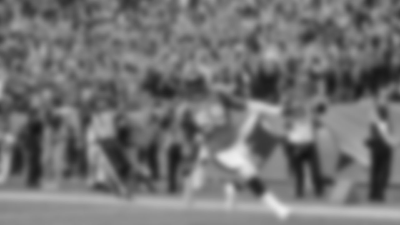 Dec. 2, 2012: Von Miller glides into the end zone after making his first career interception against the Buccaneers.