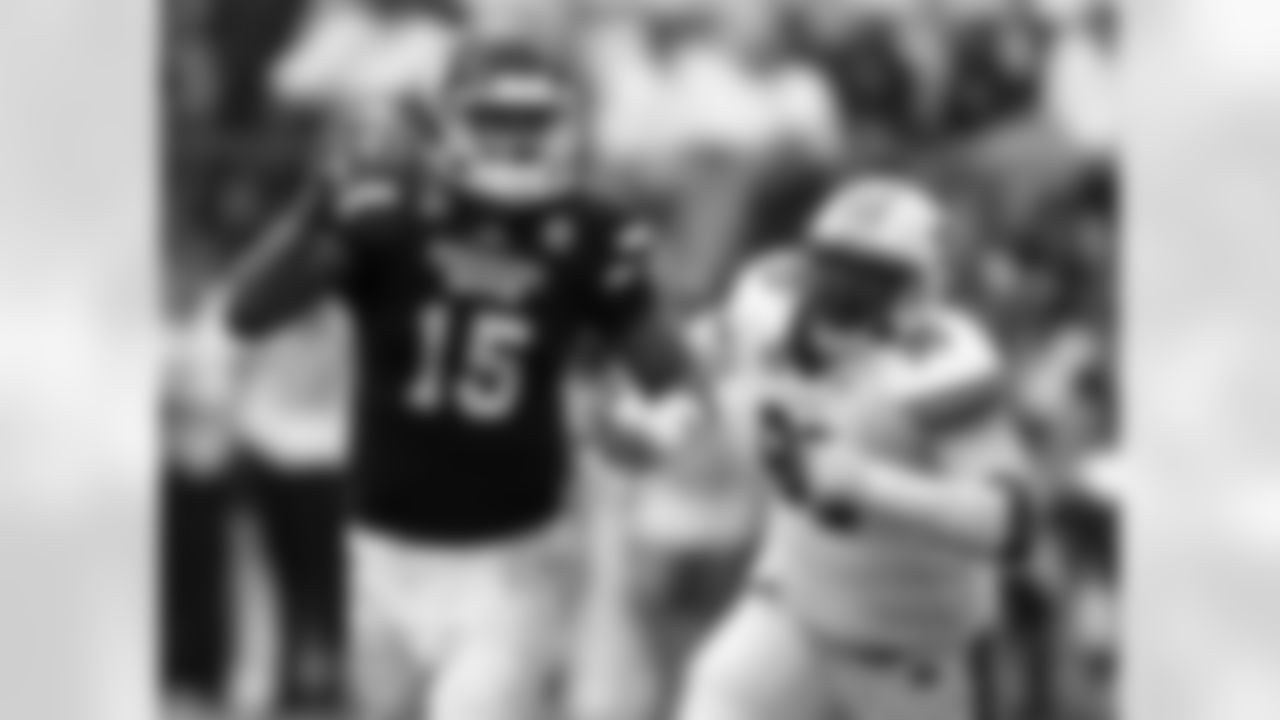 Auburn defensive tackle Gabe Wright pursues Mississippi State quarterback Dak Prescott.