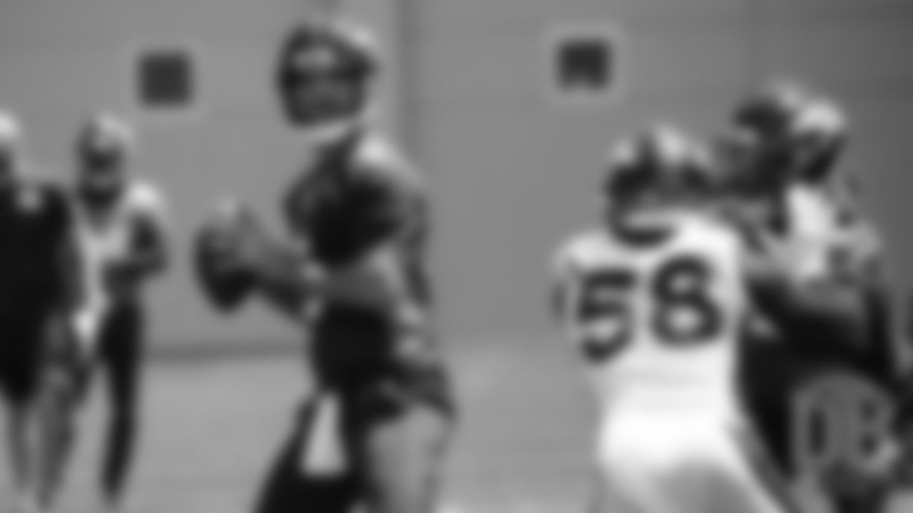Joe Flacco looks to pass during the Broncos' practice on the ninth day of their OTAs on May 31, 2019.