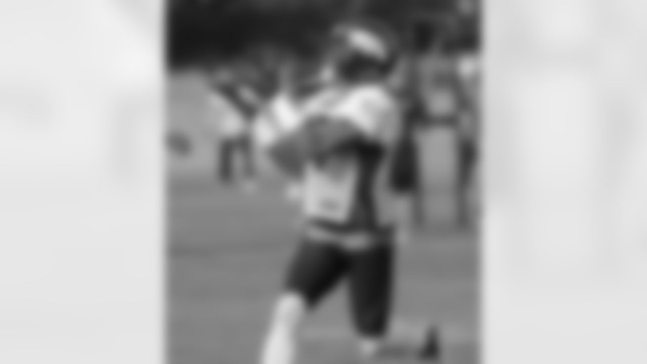 WR Andre Caldwell looks for the ball over his shoulder.