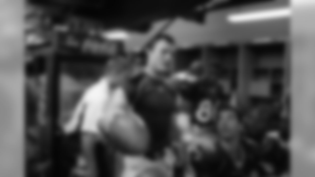 John Lynch celebrates and thanks his teammates after receiving a game ball during the NFL game against the Tampa Bay Buccaneers on October 3, 2004 at Raymond James Stadium in Tampa, Florida.