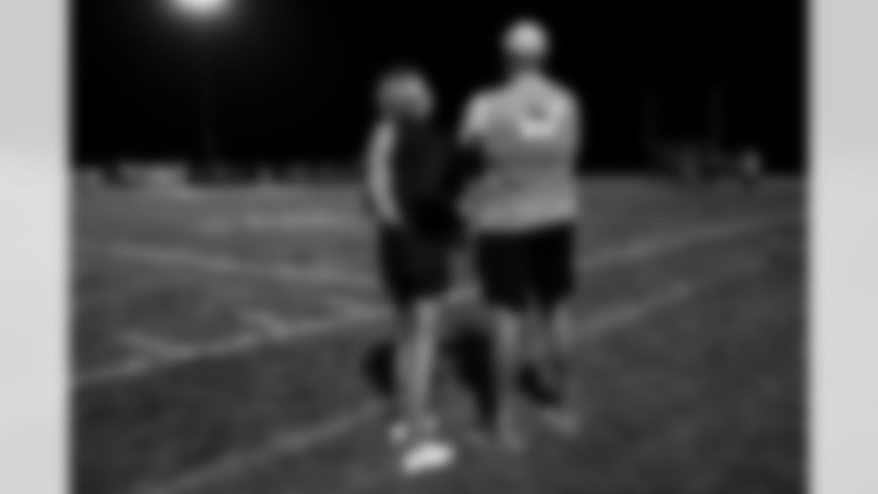 Dalton Risner and his fiancé at Dalton Risner's jersey retirement ceremony at Wiggins High School in Wiggins, CO on September 2, 2021.