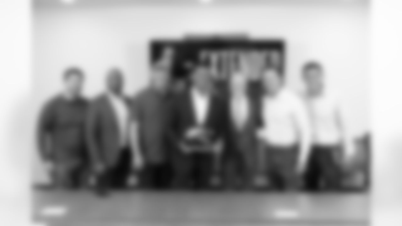 Russell Wilson poses for photo with Rich Hurtado, Damanii Leech, Nathaniel Hackett, Mark Rodgers, George Paton and Patrick Smyth after signing his contract extension on Thursday, September 1, 2022 at UCHealth Training Center in Englewood, Colorado.
Photo by Gabriel Christus/Denver Broncos