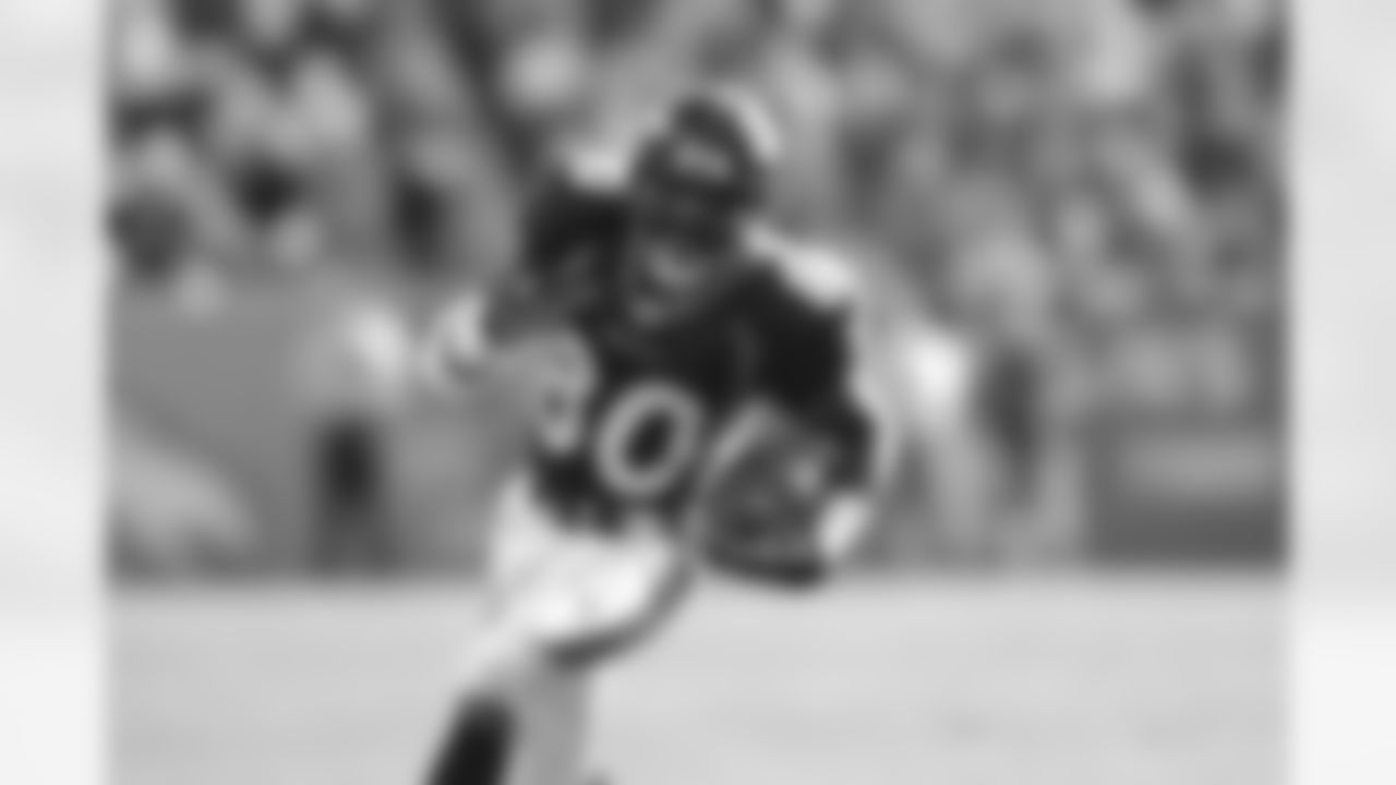 Rod Smith heads upfield after making a reception during a 20-17 win over the Panthers at Invesco Field in Denver on Oct. 10, 2004.