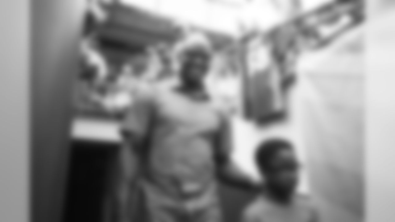 Former Broncos outside linebacker DeMarcus Ware and his son pregame before the Broncos' Week 2 game against the Dallas Cowboys on September 17, 2017. (Photo by Ben Swanson)