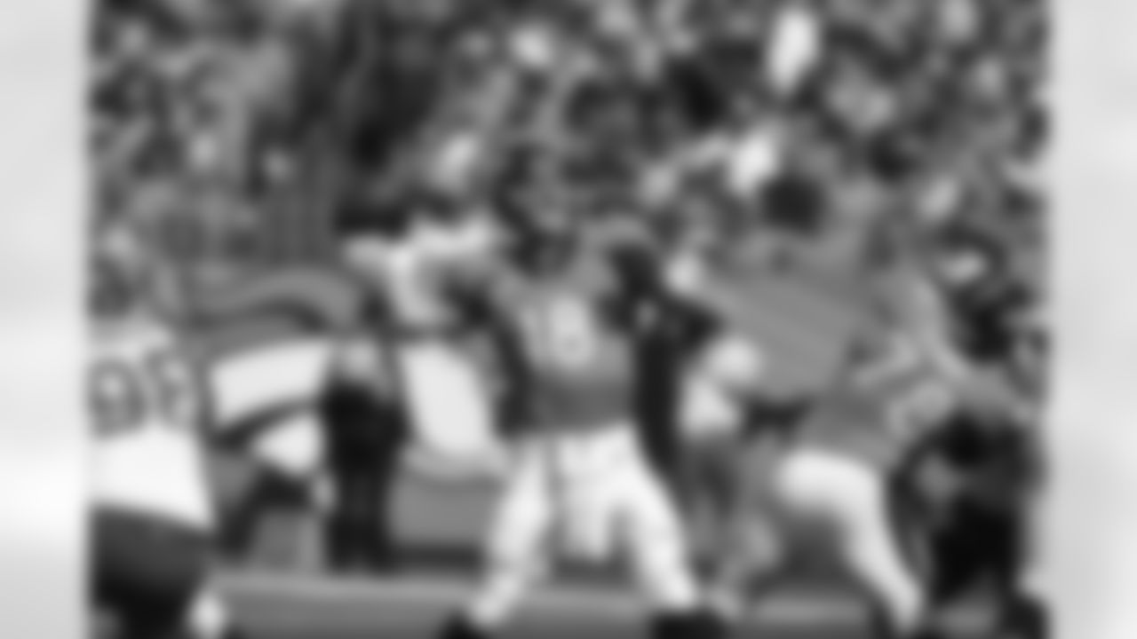 Denver Broncos quarterback Peyton Manning (18) unleashes a 48 yard pass to Emmanuel Sanders on the opening play against the Kansas City Chiefs in the NFL game at Sports Authority Field in Denver,Colo. September 14, 2014