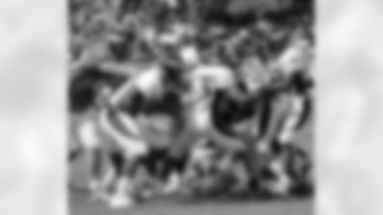The defense swarms Hillman.