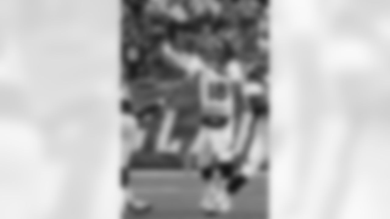 QB Peyton Manning gets off a pass during first-half action against the New England Patriots.