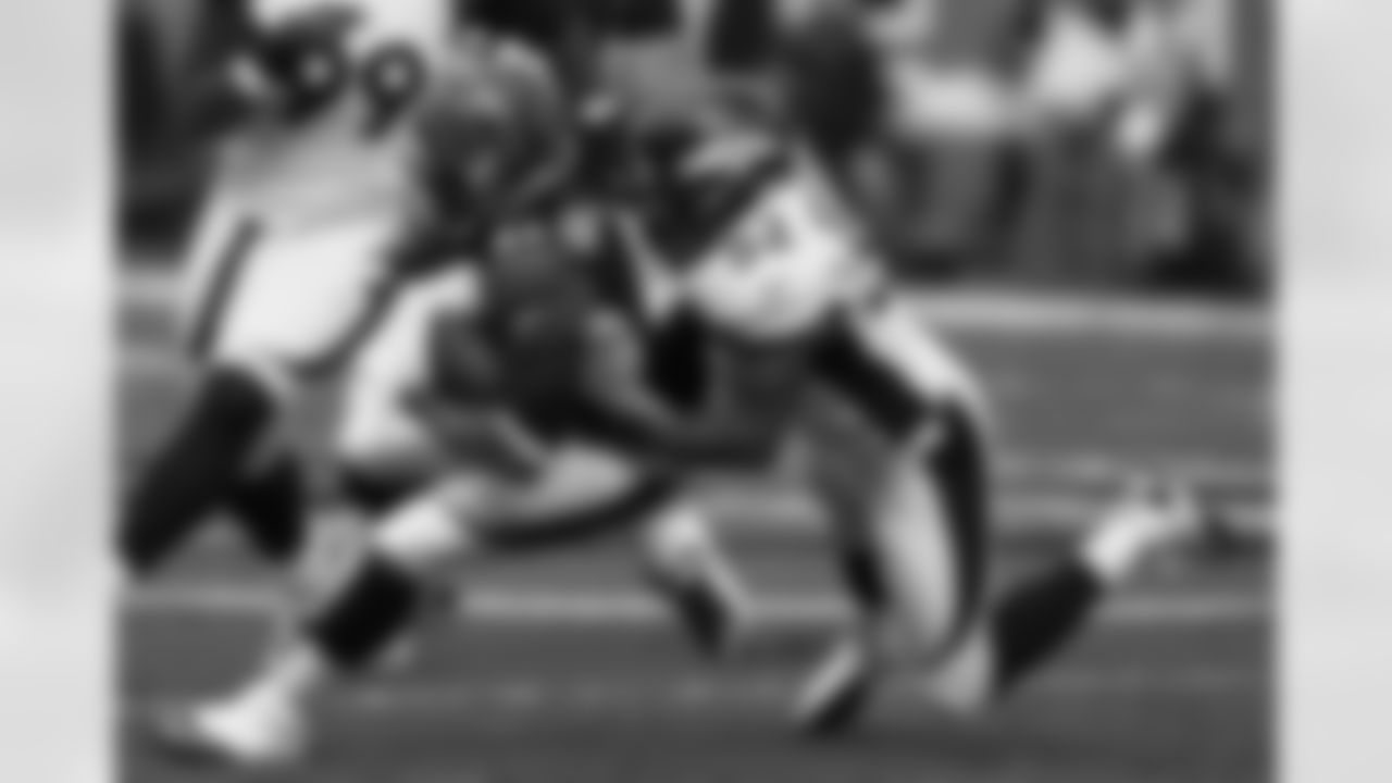 LB Wesley Woodyard brings down Green-Ellis.