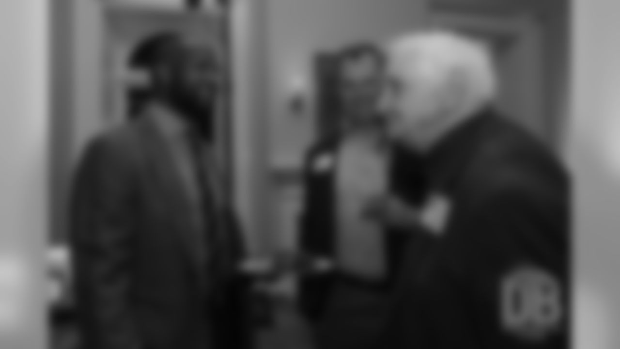 Hall of Fame finalists Champ Bailey, John Lynch and Gil Brandt talk together at the Pro Football Hall of Fame's Celebration of Excellence Reception in Atlanta on January 31, 2019.