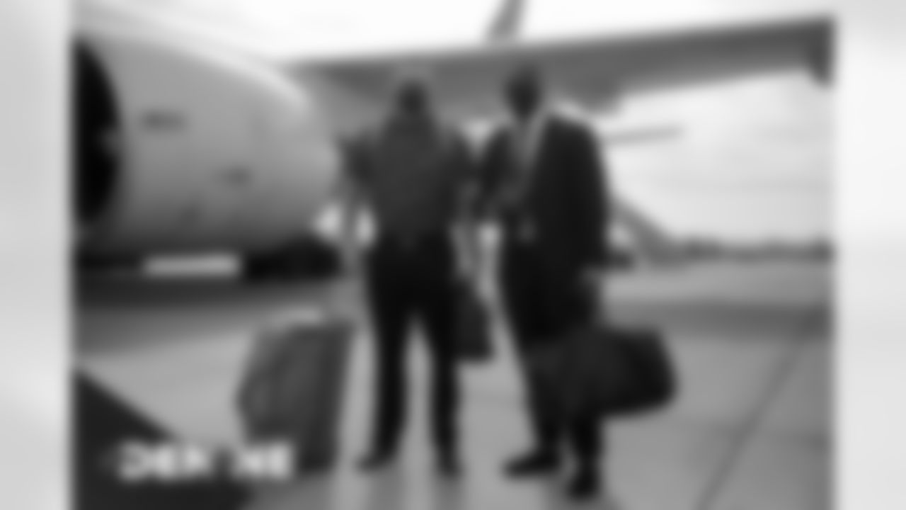 Garett Bolles and Calvin Anderson on the tarmac at Denver International Airport on October 17, 2020 during the team's travel to New England for a Week 6 game against the Patriots. (Photo by Ben Swanson)