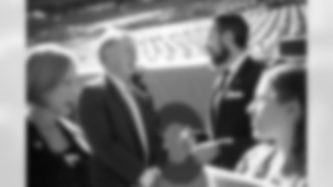 President and CEO Joe Ellis talks with Josh Kroenke during a press conference to promote Denver's World Cup bid to be a host city at Empower Field at Mile High in Denver, Colorado on October 25, 2021. (Photo by Ben Swanson)