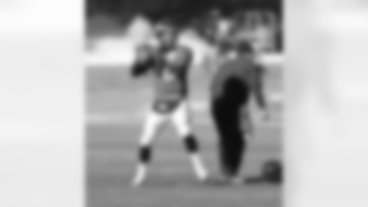 Manning throws a pass during Wednesday's session.