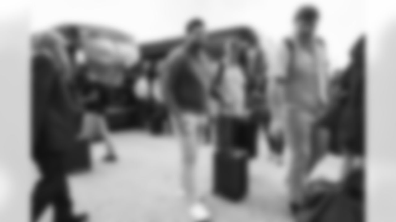 Matt Henningsen on the tarmac at Denver International Airport on October 1, 2022 during the team's travel to Las Vegas for a Week 4 game against the Raiders. (Photo by Ben Swanson)