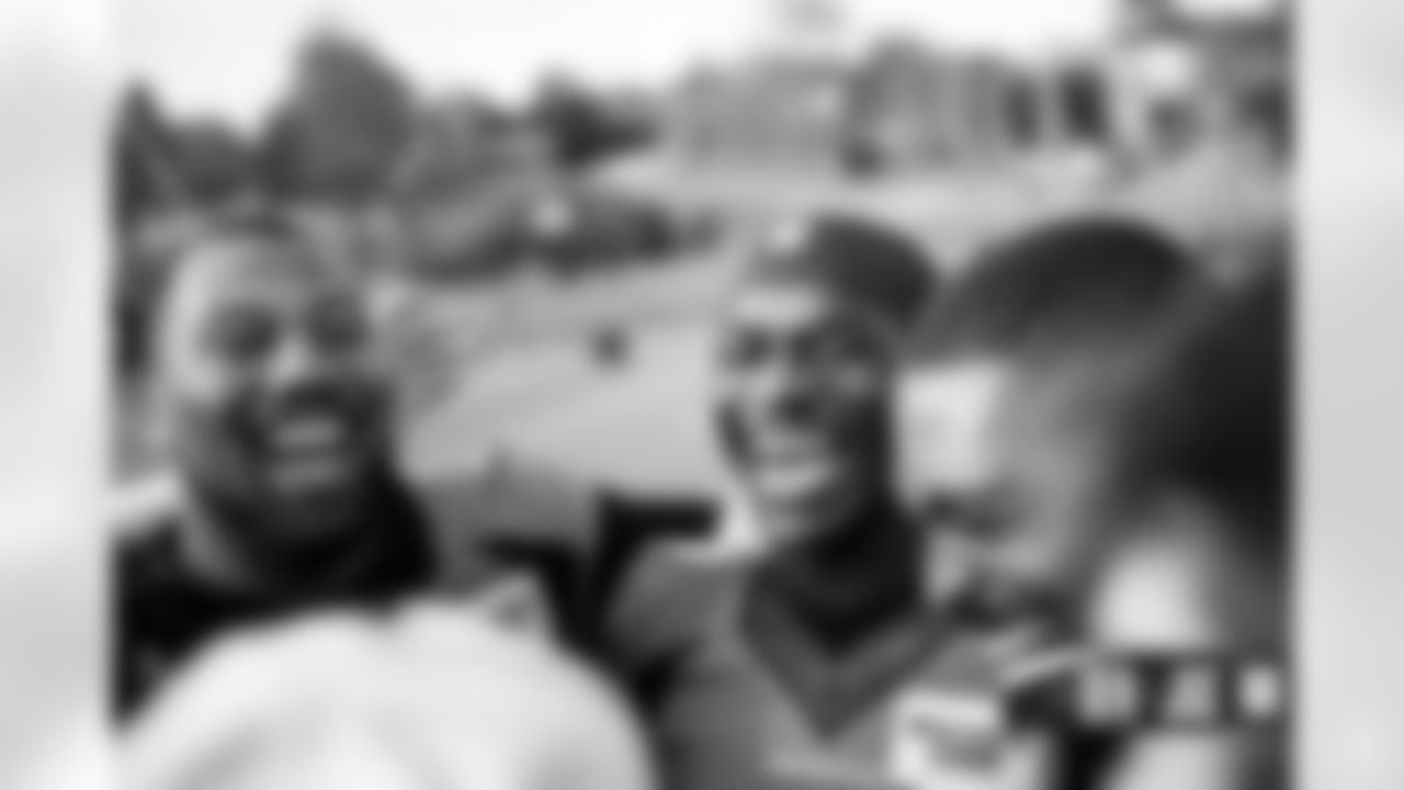 Bradley Chubb and Jonathan Kongbo smile after practice at Harrow School just outside London, England in the United Kingdom on October 28, 2022. (Photo by Ben Swanson)