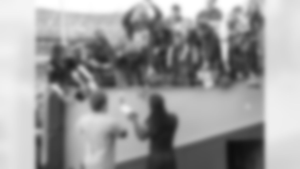 Broncos Players Sign Autographs