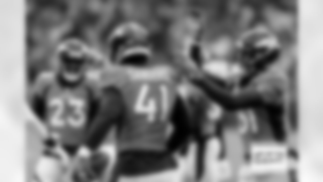 Denver Broncos linebacker Drew Sanders (41) celebrates with safety Justin Simmons (31) after recovering a muffed punt during the Broncos' Week 8 game against the Kansas City Chiefs at Empower Field at Mile High in Denver, Colorado on October 29, 2023. Photo by Gabriel Christus / Denver Broncos