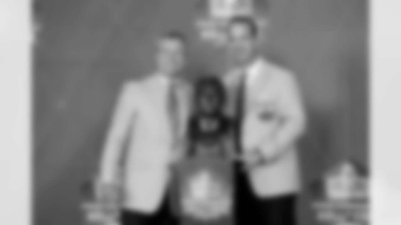 John Lynch (left) stands with Peyton Manning next to Lynch's bust during the 2021 Hall of Fame Weekend on Sunday, August 8, 2021 in Canton, Ohio. (Lauren Bacho/NFL)