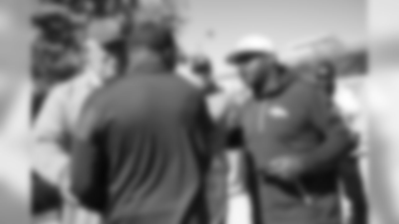 Al Wilson Broncos alumni watch the team's walkthrough and meet with current players and coaches afterward on October 12, 2019. (Photo by Ben Swanson)