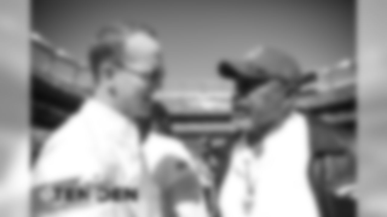 Peyton Manning and Rich "Tombstone" Jackson before the Broncos' game against the Tennessee Titans at Empower Field at Mile High on October 13, 2019. (Photo by Ben Swanson)