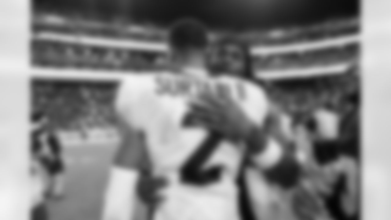 Pat Surtain II and Davante Adams after the Broncos' Week 4 game against the Las Vegas Raiders at Allegiant Stadium in Las Vegas, Nevada on October 2, 2022. (Photo by Ben Swanson)