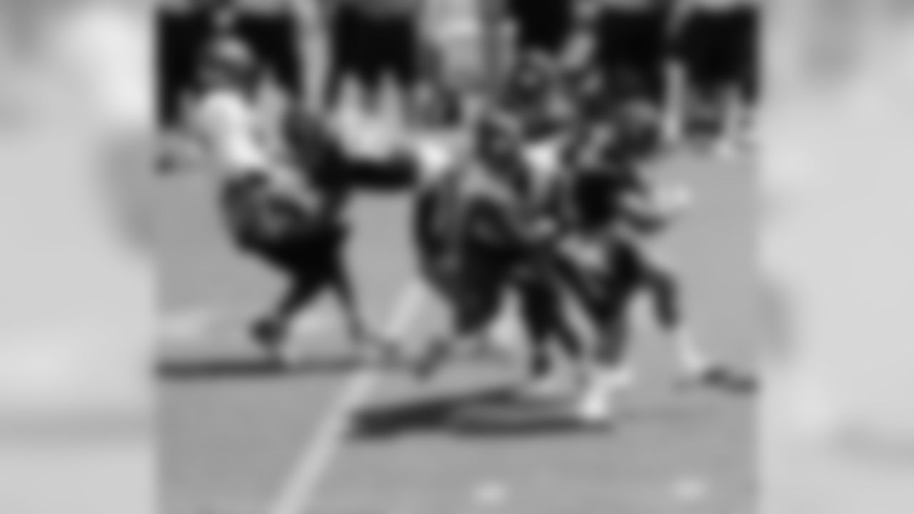 RB Jonathan Grimes and LB Brandon Marshall