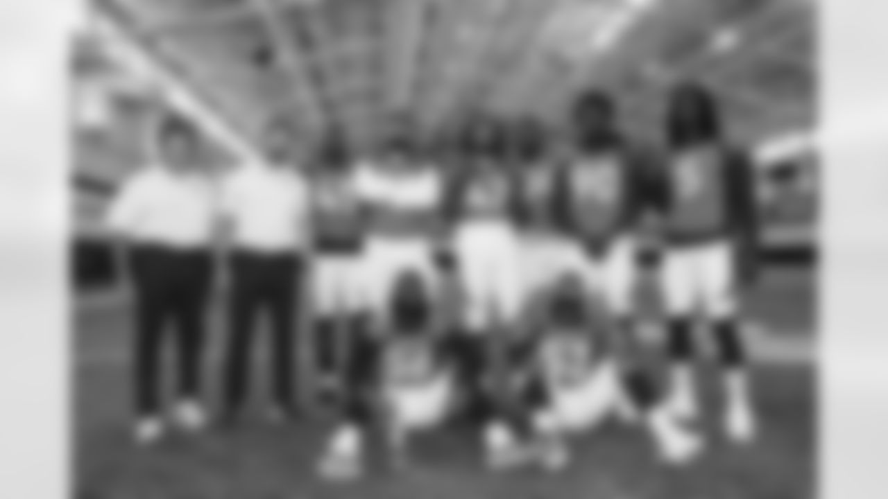 Dom Capers, Outside Linebackers Coach Bert Watts, Christopher Allen, Bradley Chubb, Nik Bonitto, Aaron Patrick, Jonathan Kongbo, Randy Gregory, Baron Browning and Jonathon Cooper during team picture day at UCHealth Training Center in Englewood, Colorado, on September 24, 2022. (Photo by Ben Swanson)