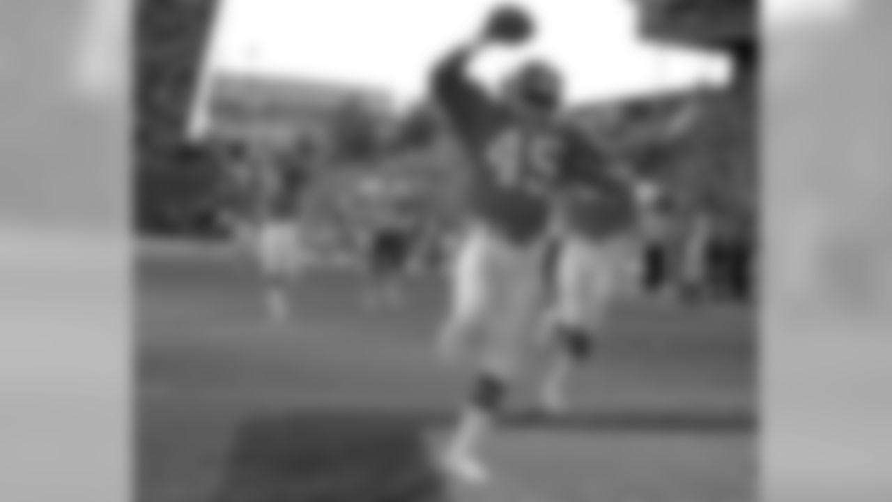 Cornerback Steve Wilson scores a touchdown during a game against the Kansas City Chiefs at Mile High Stadium. In seven years with the Broncos, Wilson played in 92 games and recorded 16 interceptions.