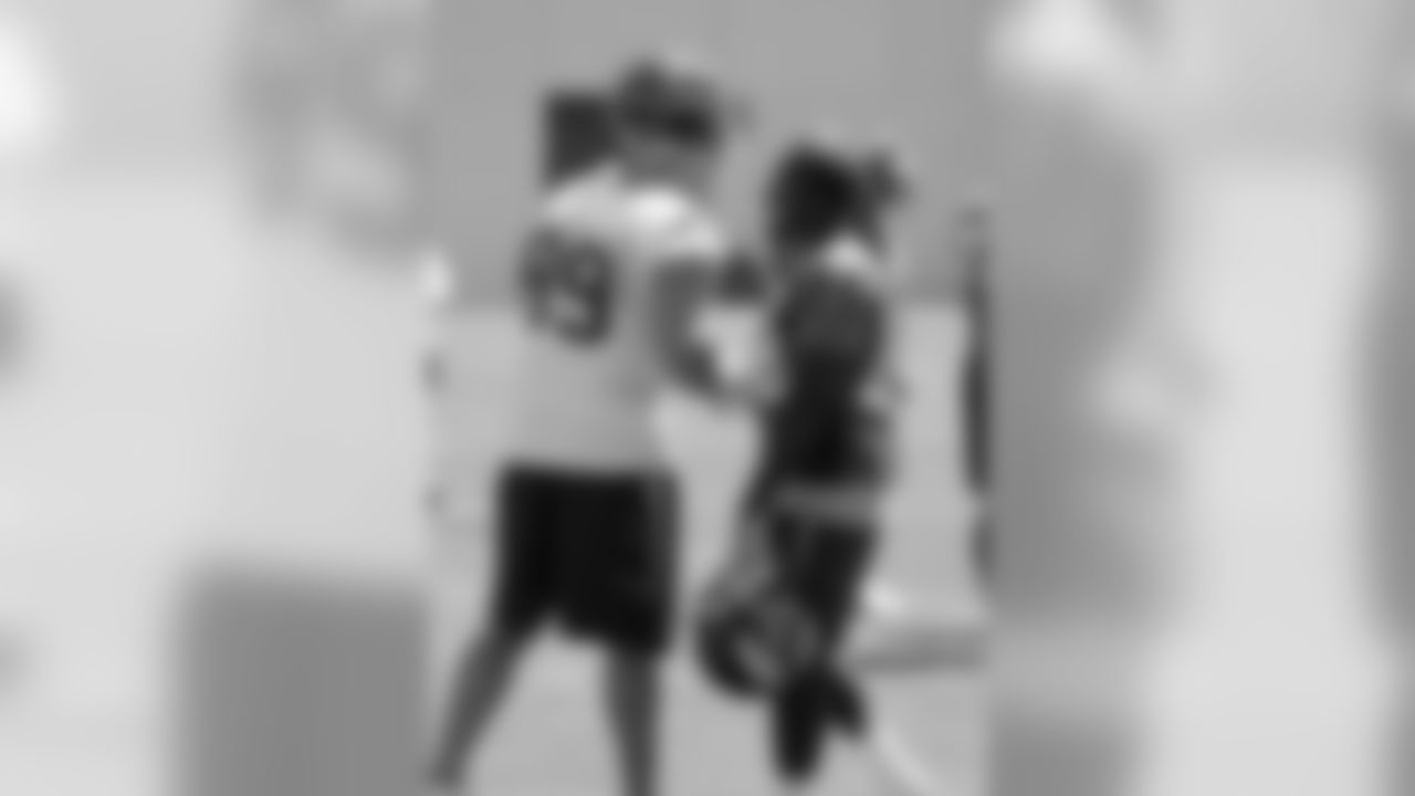 The former Wisconsin teammatess said hello during practice.