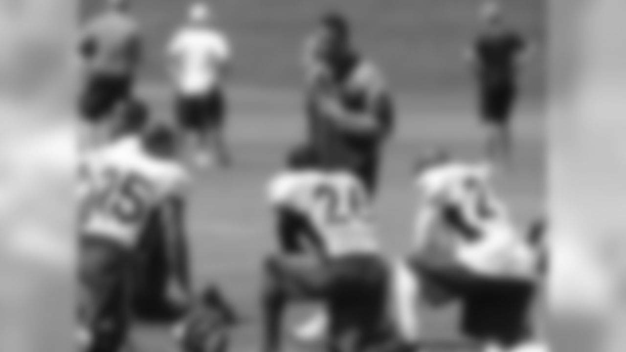 Rod Woodson with DBs Chris Harris Jr., Rahim Moore and Aqib Talib
