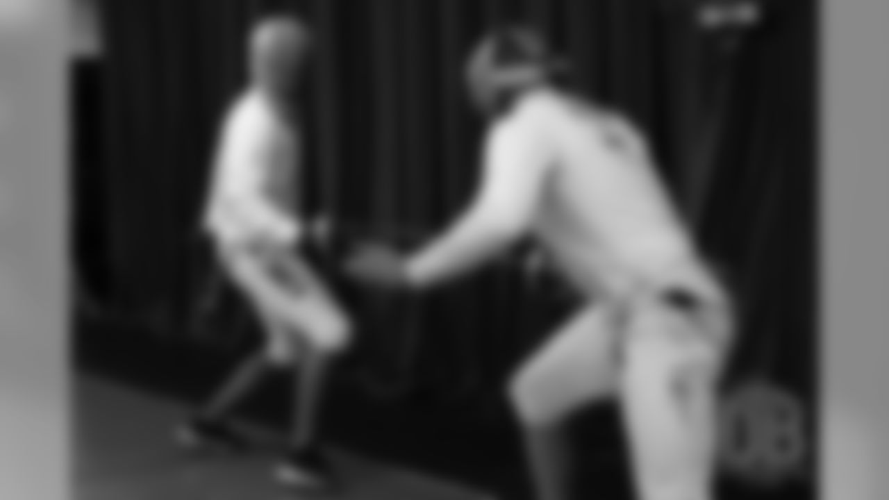 Brandon McManus and Casey Kreiter try their hands at fencing at the Denver Fencing Center on July 17, 2018.