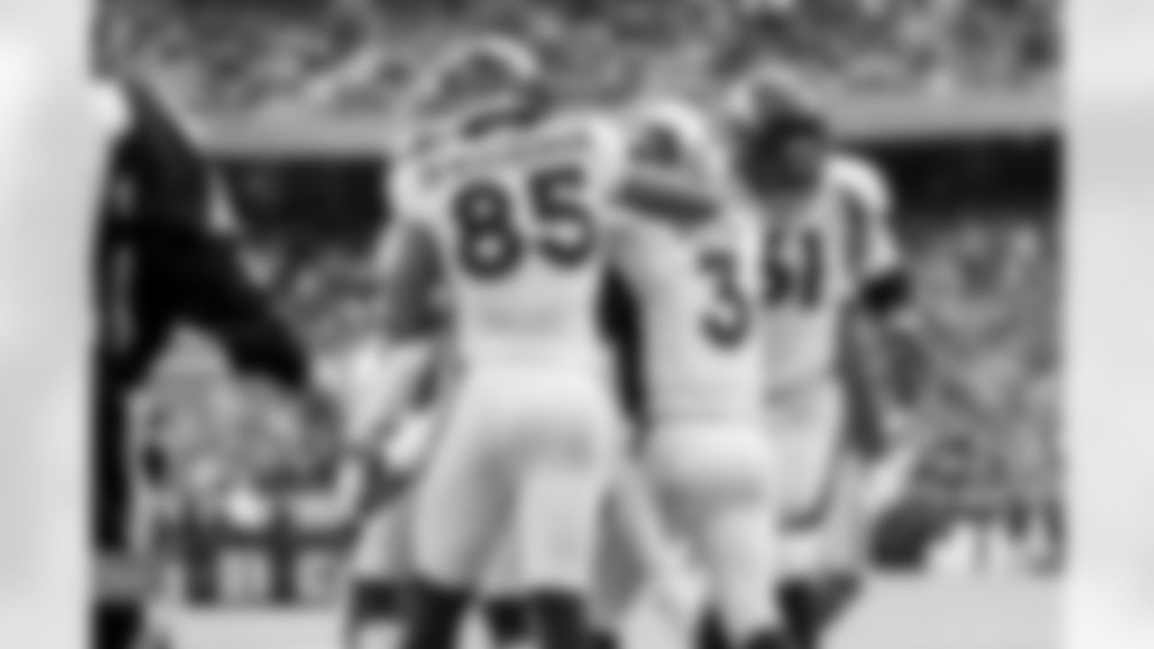 Albert Okwuegbunam, Russell Wilson and Graham Glasgow during the Broncos' Week 17 game against the Kansas City Chiefs at GEHA Field at Arrowhead Stadium in Kansas City, Missouri on January 1, 2023. Photo by Gabriel Christus