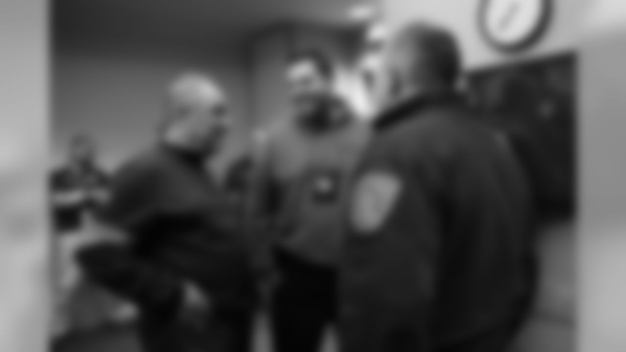 Head Coach Vic Fangio talks with Sheriff Tyler Brown (right) and another staff member during Fangio's visit to the Arapahoe County Sheriff's Office as part of Random Acts of Kindness Week on February 20, 2020 in Centennial, Colorado. (Photo by Ben Swanson/DenverBroncos.com)